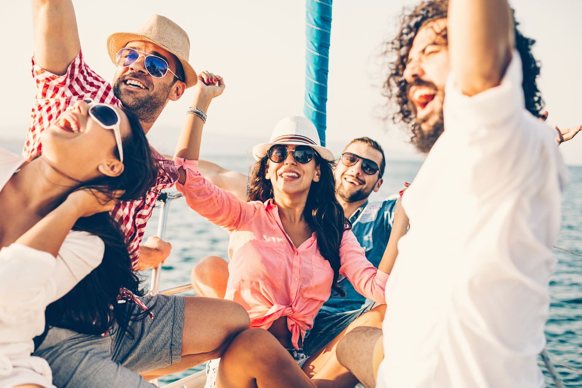 The friends are happily yachting and looking good in their yacht outfits.