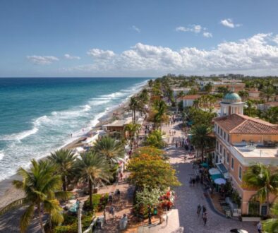 Delray Beach attractions with aerial view of the lively oceanfront promenade and beach