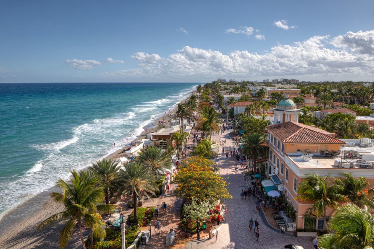 Delray Beach attractions with aerial view of the lively oceanfront promenade and beach